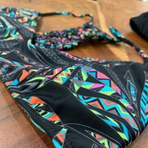 Two Alter’d State swim tops